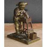 An unusual 19th century French bronze automaton table vesta, as a young knife grinder, his wheel