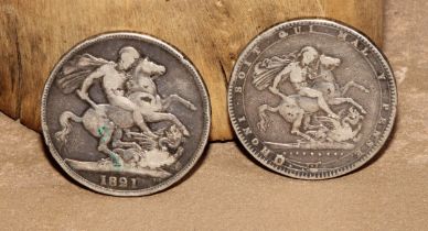 Coins - a George III crown, 1820; another, 1821 (2)