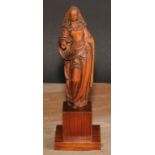 An 18th century boxwood figure, carved as the Madonna, 15cm high, later oak plinth, 20cm high
