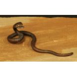 An Austrian cold painted bronze, of a snake, 13cm long