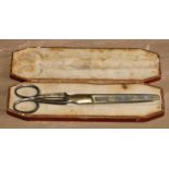 A pair 19th century steel and gilt scissors, by M C Cronstedt, 17.5cm long, fitted case