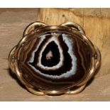 A large 19th century banded agate and pinchbeck brooch, 7.5cm wide, c.1880