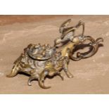 A 19th century bronze novelty pastille burner, cast as a bird and a nest of chicks, hinged cover,