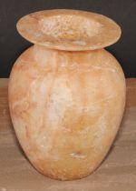 An Egyptian alabaster ovoid vase, 15cm high