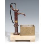A l9th/early 20th century painted and polished brass scratch built model, of a water pump and