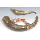 A 19th century Persian brass crescent shaped powder flask, engraved and chased with strapwork and