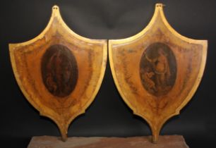 A pair of George III Neoclassical shield shaped screens, each transfer printed en grisaille with