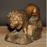 Modern British School, a gilt patinated terracotta maquette, of a lion, 25cm long