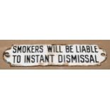 An enamel railway sign or notice, Smokers Will be Liable to Instant Dismissal, 15.5cm wide