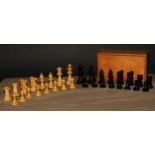 A boxwood and ebonised Staunton pattern chess set, weighted bases, the Kings 8cm high