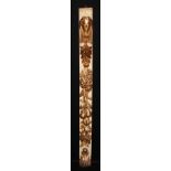 A Baroque painted and parcel-gilt pilaster, carved and gessoed with a female term and flowering,