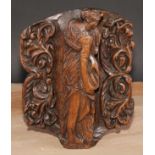 A North European walnut panel, carved in relief with Diana, flanked by scrolling foliage, 27.5cm x