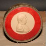 A wax portrait roundel, depicting Napoleon Bonaparte, bust length, facing to sinister, 14.5cm diam