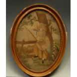 A George III oval silk and wool work picture, depicting a finely dressed lady fishing, 25cm x