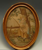 A George III oval silk and wool work picture, depicting a finely dressed lady fishing, 25cm x