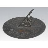 A bronze sundial, shaped gnomon, Roman numerals, engraved Seize the Present Moment, The Evening Hour