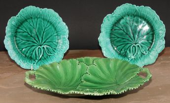 A Copeland majolica table centre dish, moulded with leaves, rustic branch handles, 33cm wide,