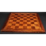 An early 20th century mahogany and parquetry chess board, crossbanded field, 52cm square