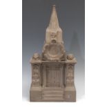 A substantial Victorian stone architectural pocket watch stand, carved as a Gothic doorway, panelled