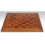 An early 20th century walnut, rosewood and yew parquetry chess board, 40.5cm square, c.1910