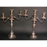 A near pair of George IV Old Sheffield Plate rounded rectangular table candelabra, fluted borders,