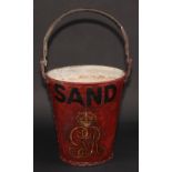 A George V fire bucket, inscribed Sand and painted with crowned GRV cipher, 30cm high