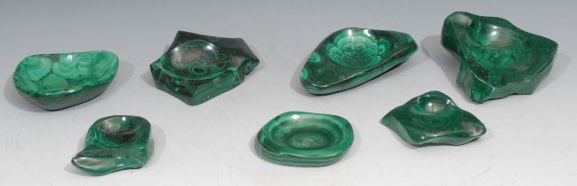 Geology - Seven malachite bowls, each dished from various shapes, the largest 14cm wide, mid 20th