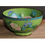 A Japanese cloisonne enamel circular pedestal bowl, decorated in polychrome with flowering stems