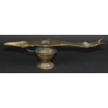 A 19th century Indian bronze lamp, 38cm long