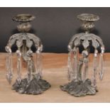 A pair of post-Regency dark patinated bronze candle lustres, campana sconces with detachable