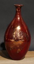 An Art Pottery ovoid vase, decorated in silver lustre with a clown on a red ground, 24cm high