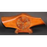 Aeronautica - an Art Deco mantel timepiece, formed from a section of aeroplane propeller, the 17.5cm