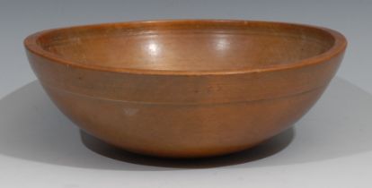 A 19th century turned treen dairy bowl, 24cm in diameter, c.1850