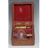 A Victorian gilded brass and clear glass breast pump by S Maw & Son, Thompson Place, London, red