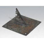 A bronze sundial, shaped gnomon, Roman numerals, engraved Shaddowes (sic) and dated 1711, 15.5cm