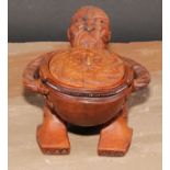 A Maori figural pouaka box, carved overall with puhoro, 18.5cm wide, New Zealand