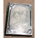 A 19th century silver coloured metal mounted mother of pearl aide memoir, the front carved with a