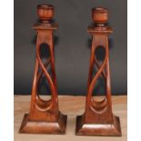 Treen - a pair of unusual mahogany square open-twist table candlesticks, spreading bases, 34cm high,