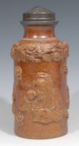 A 19th century cylindrical salt glazed stoneware snuff jar, pewter collar and detachable cover,