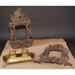 A pair of Victorian cast iron photograph frames, each crested by putti rowing a boat, 37cm high, Rd.