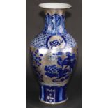 A Chinese baluster vase, decorated in silver lustre and underglaze blue with flowers, clouds and