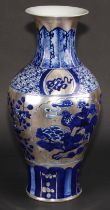 A Chinese baluster vase, decorated in silver lustre and underglaze blue with flowers, clouds and