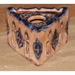 A maiolica triform inkwell, pierced and decorated in tones of blue in the Moorish Islamic taste,