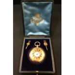 A Victorian 18ct gold half hunter pocket watch, white enamel dial, Roman numerals, minute track,