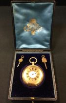 A Victorian 18ct gold half hunter pocket watch, white enamel dial, Roman numerals, minute track,