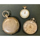 A 19th century Swiss silver hunter pocket watch, c.1894; a mother of pearl lady's fob watch; an