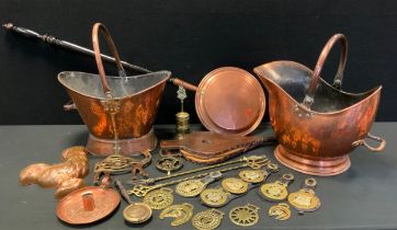 A Victorian copper helmet shaped coal scuttle; another; warming pan, horse brasses etc