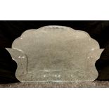 An unusual French etched glass wall mirror, shaped plate