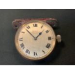 Automobilia - a vintage motor car dashboard clock, the 6cm silvered dial inscribed Watford,