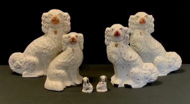 A pair of Staffordshire dogs, 33cm; another similar; etc